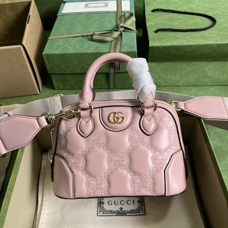G*u*i top handle bags